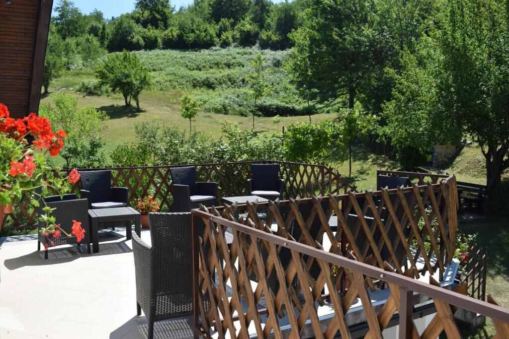 Terrace with outdoor furniture at Rooms Ruza